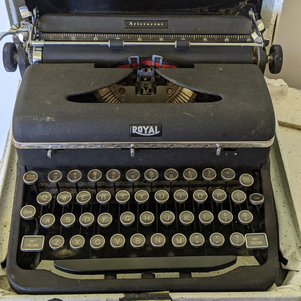 Close up of typewriter letter buttons