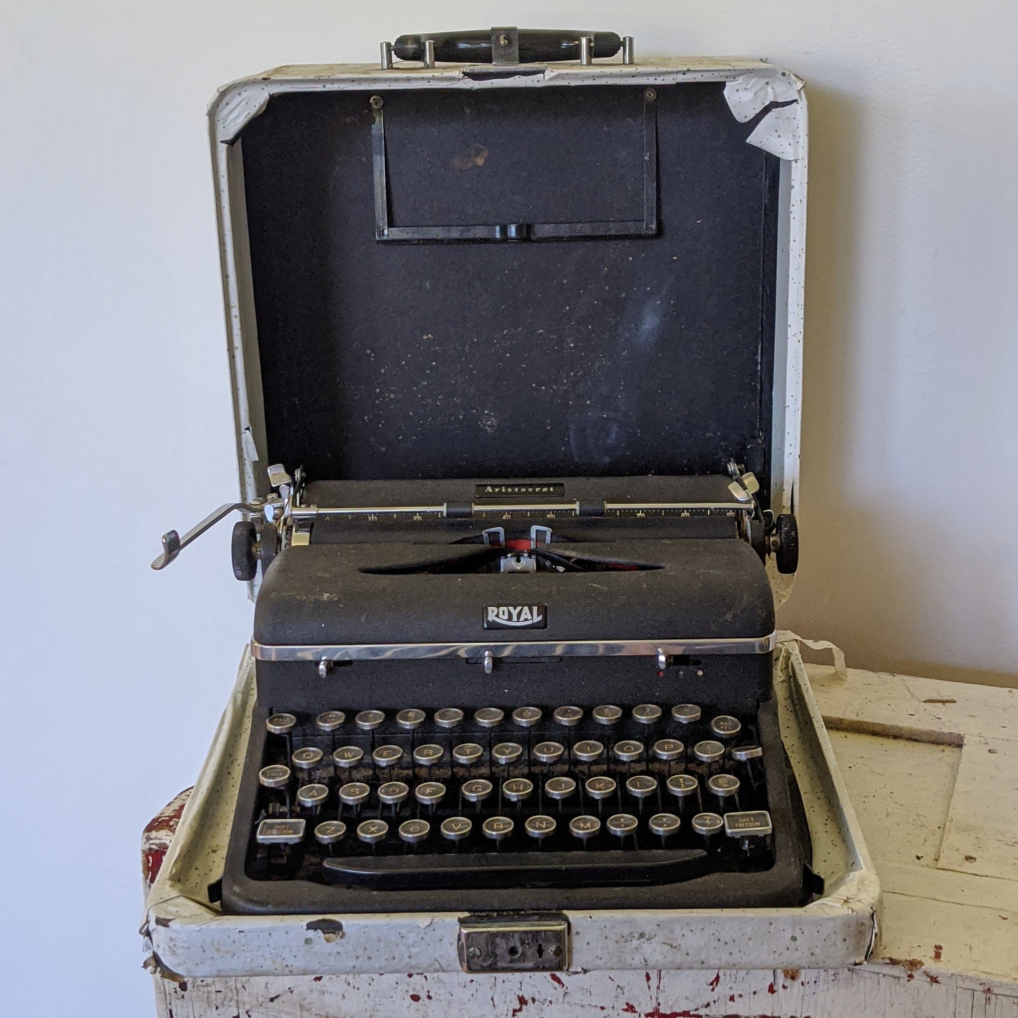 Vintage, black typewriter with round letter buttons
