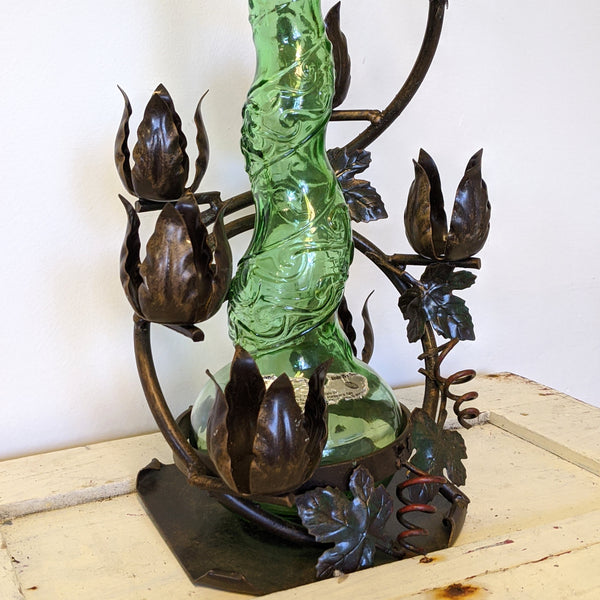 Close up of metal flower on holder