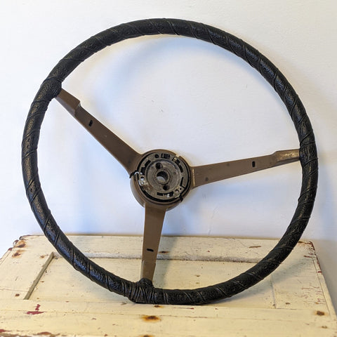 Black and brown vintage hot rod car wheel 