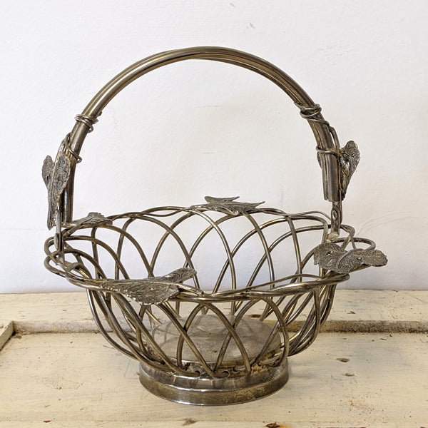 Vintage metal basket with leaves side
