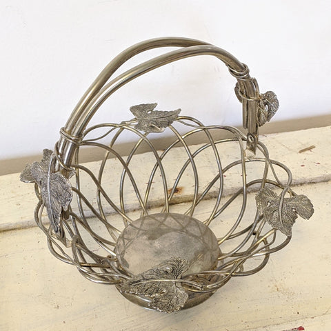 Vintage metal basket with leaves